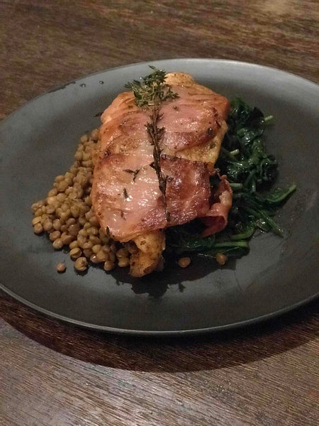 Prosciutto wrapped Jerk Fish with Spinach and Lentils