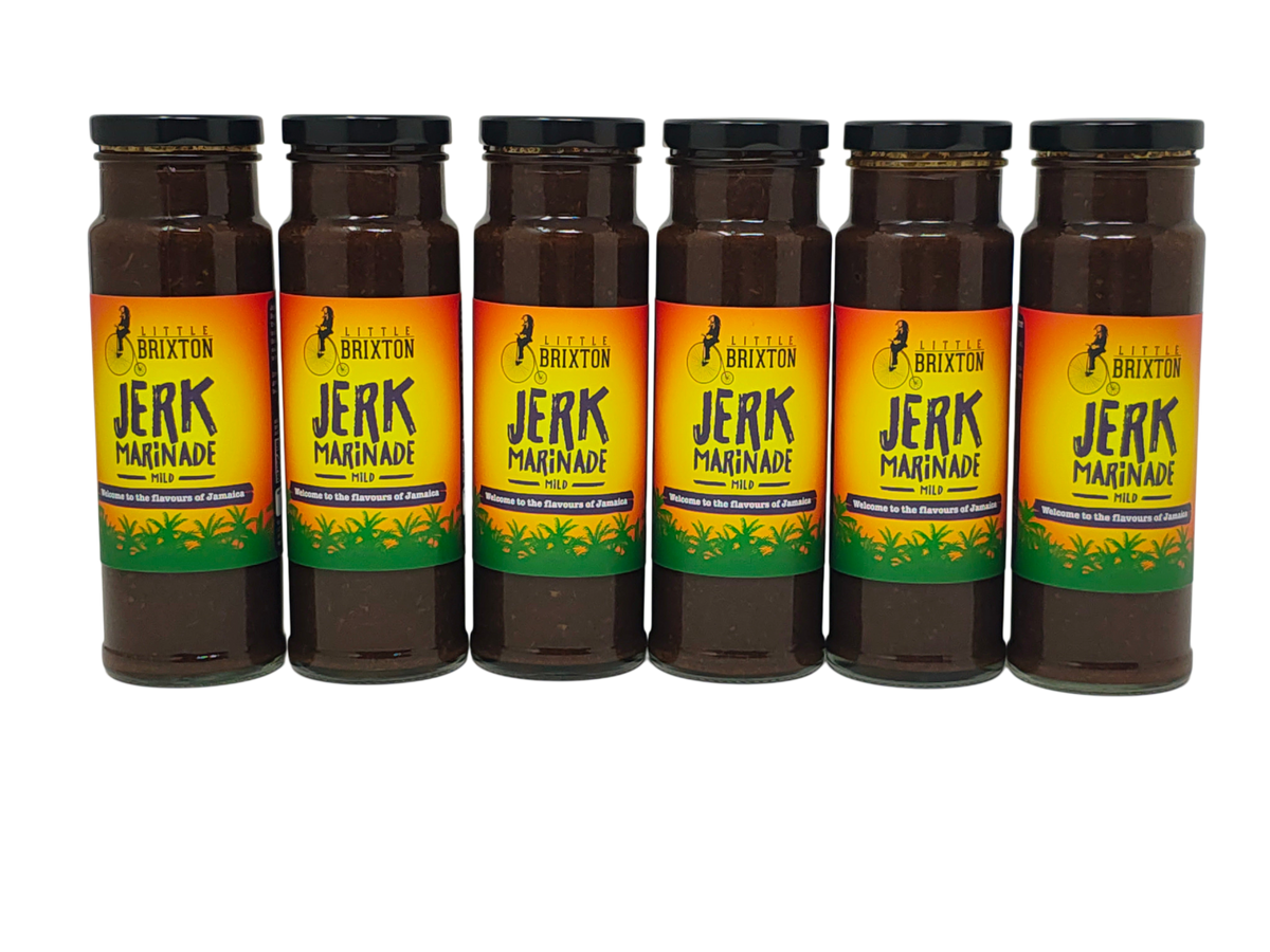 Six glass jars of Little Brixton Jerk Marinade featuring a vibrant yellow, orange, and green Jamaican-style label.